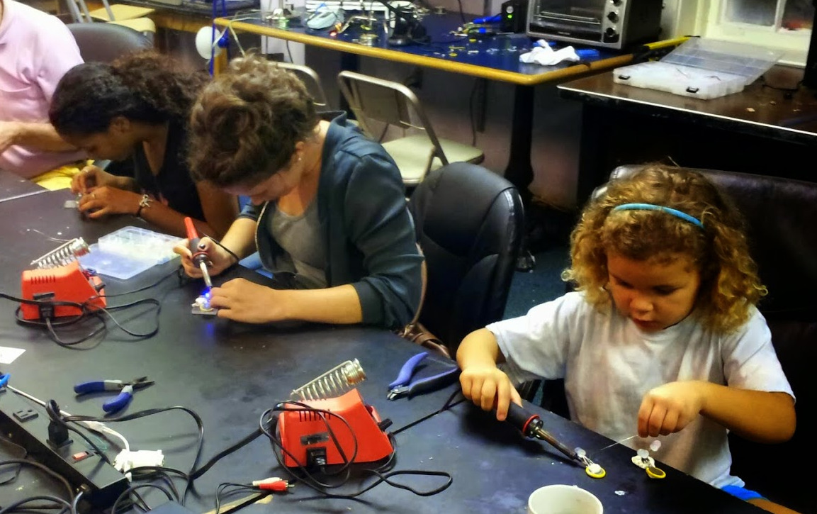 Student learning to solder