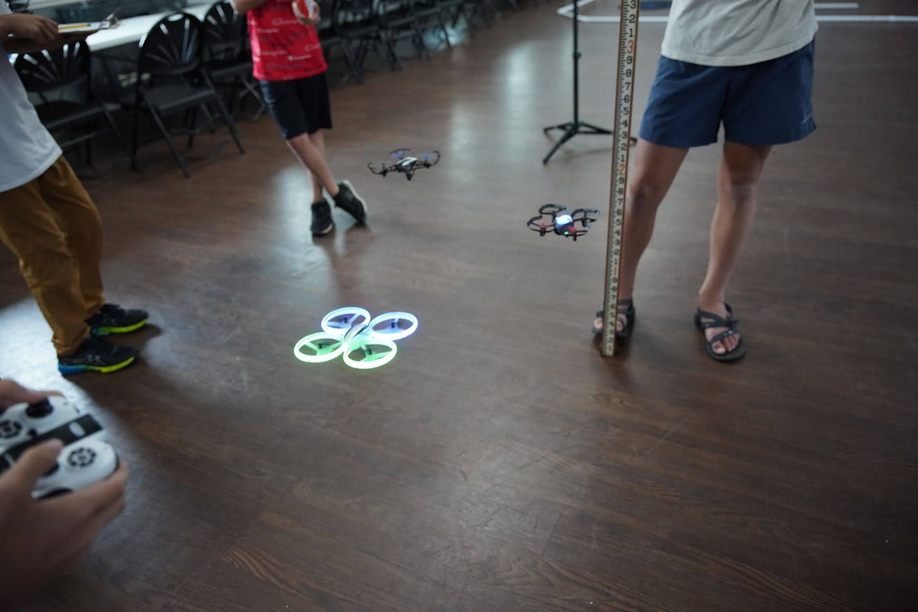 Multiple drones flying with LED lights during training