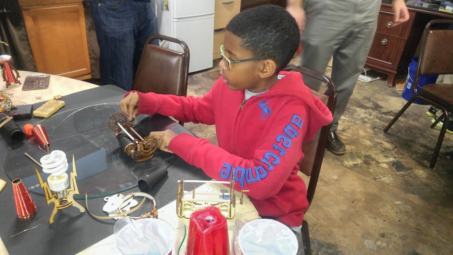 Student winding copper wire for mini Tesla coil